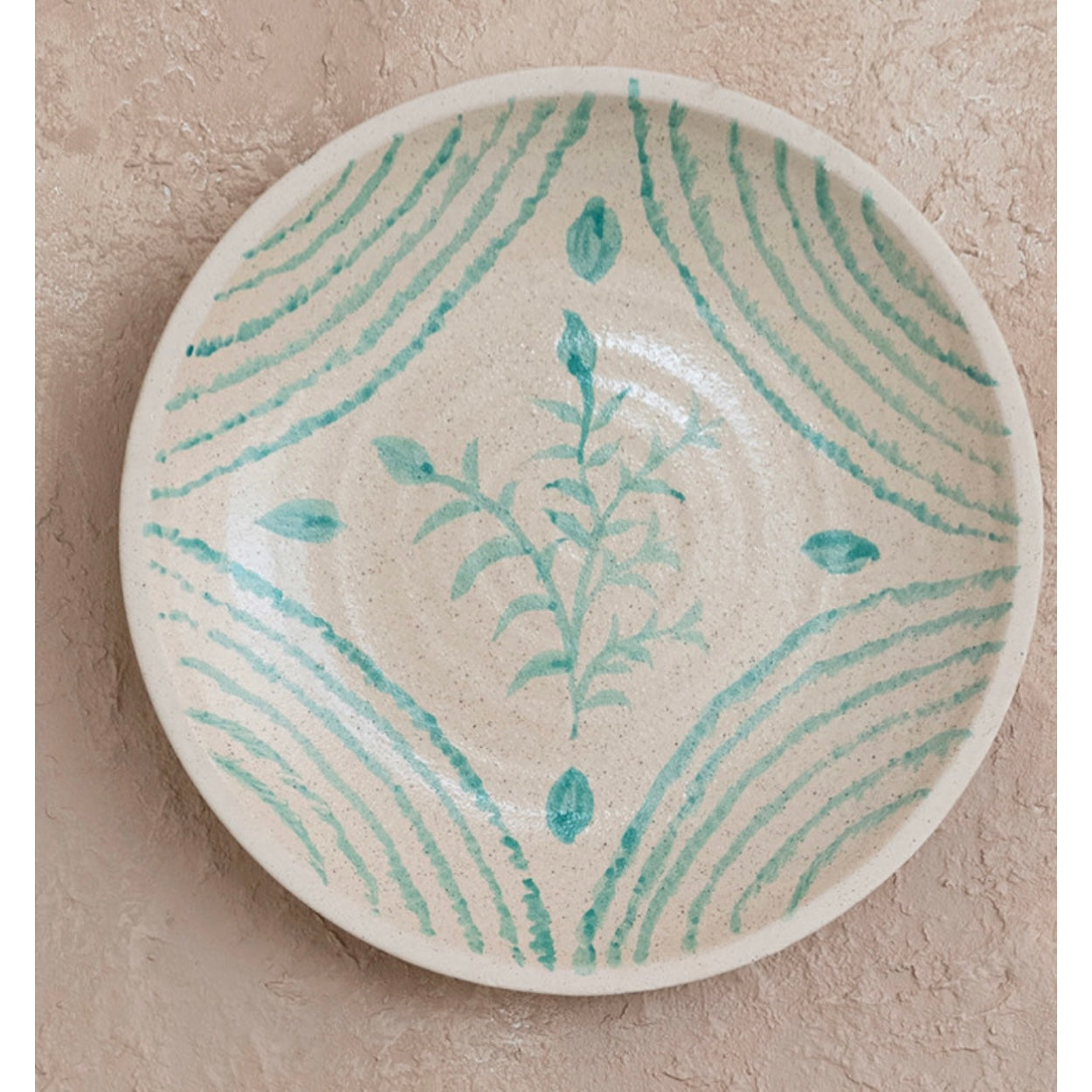 “Aqua Essence Terra-cotta Wall Plates."