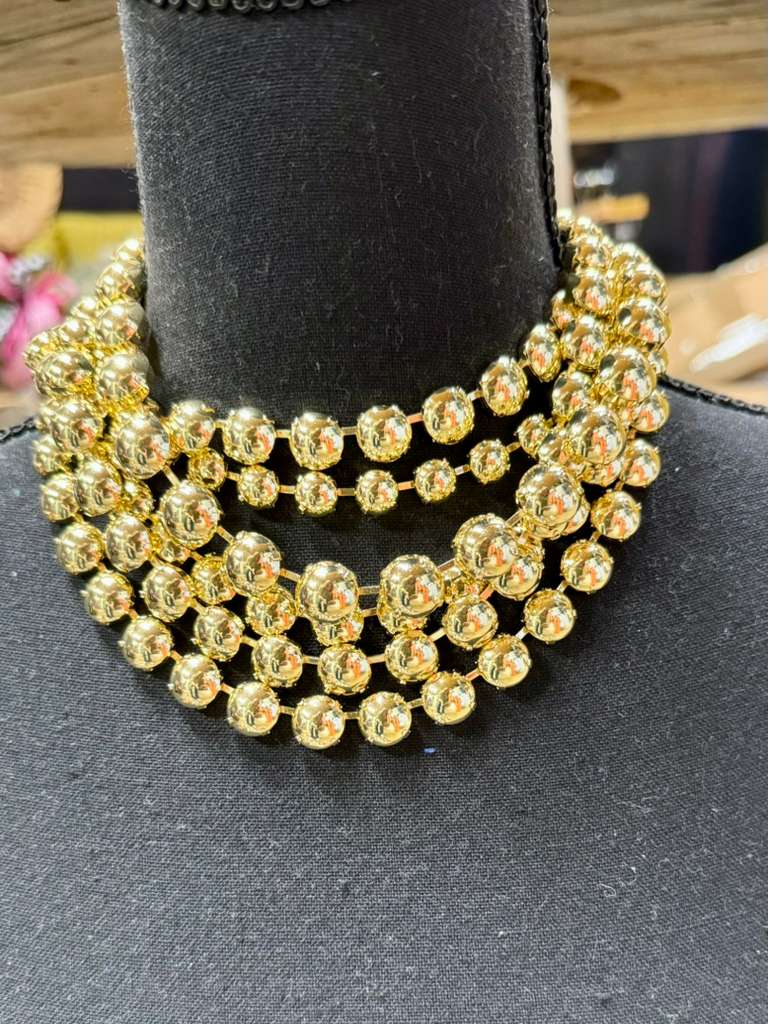 Gold stones with prongs Necklace